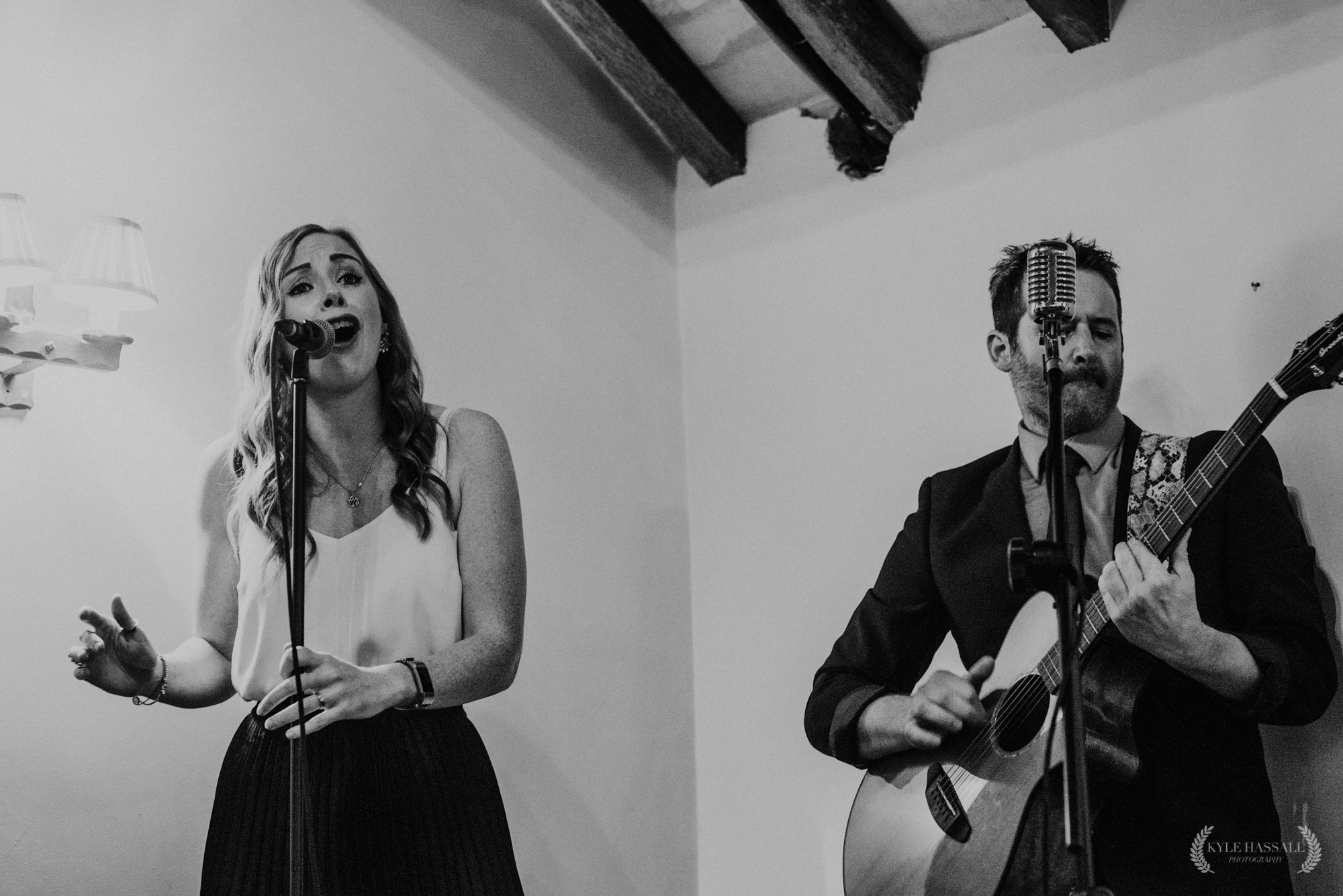 Guitarist and singer performing at wedding