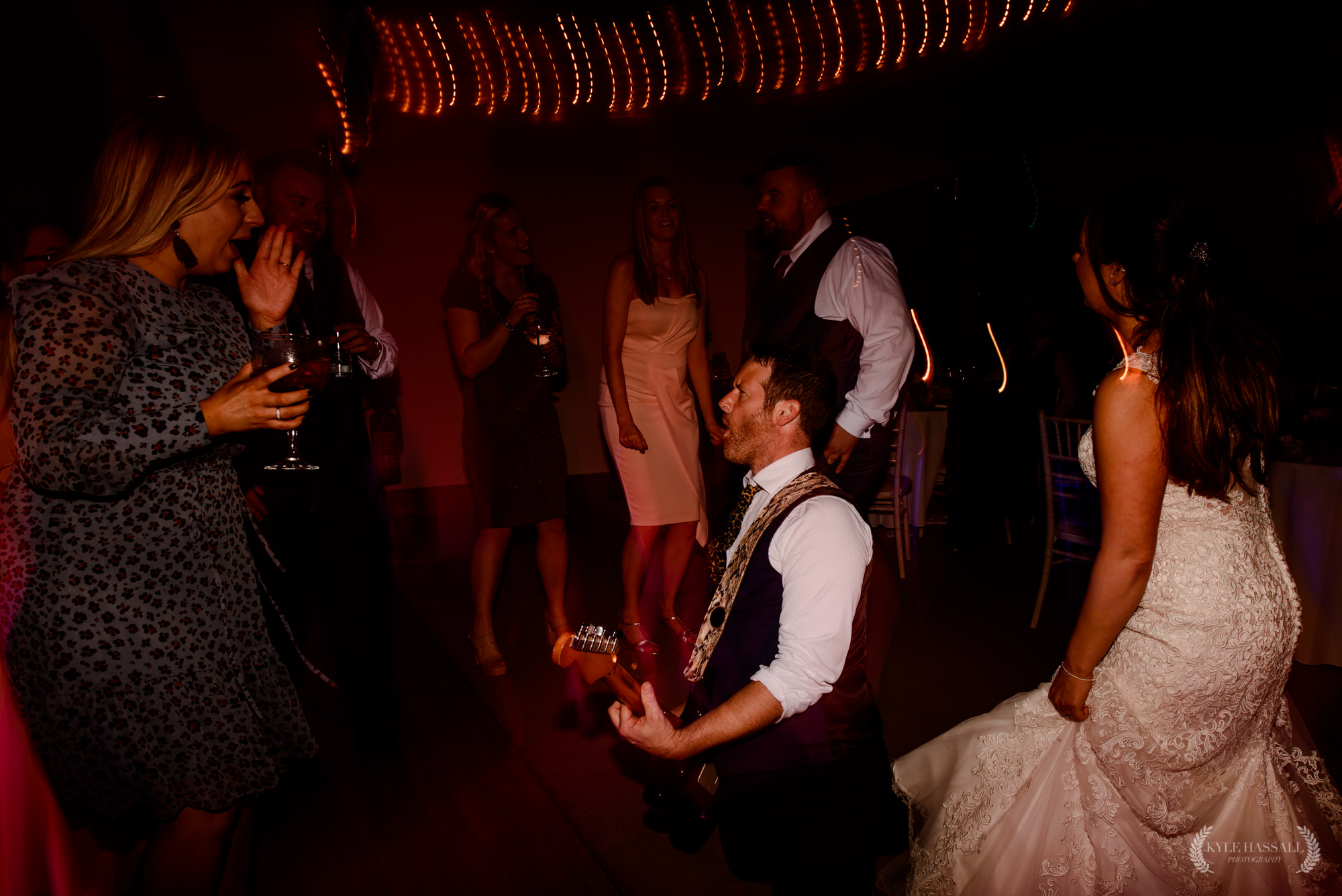 Manchester_wedding_band guitarist on the dance floor